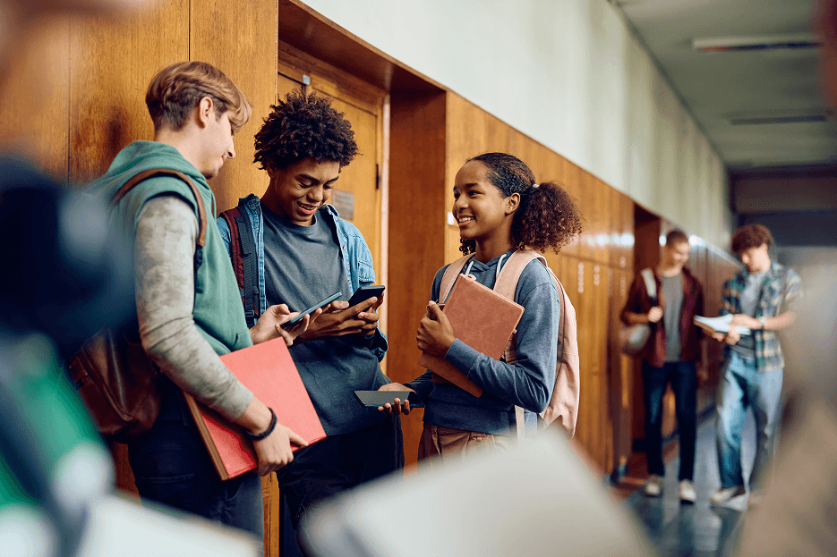 a couple of people that are standing in front of a building