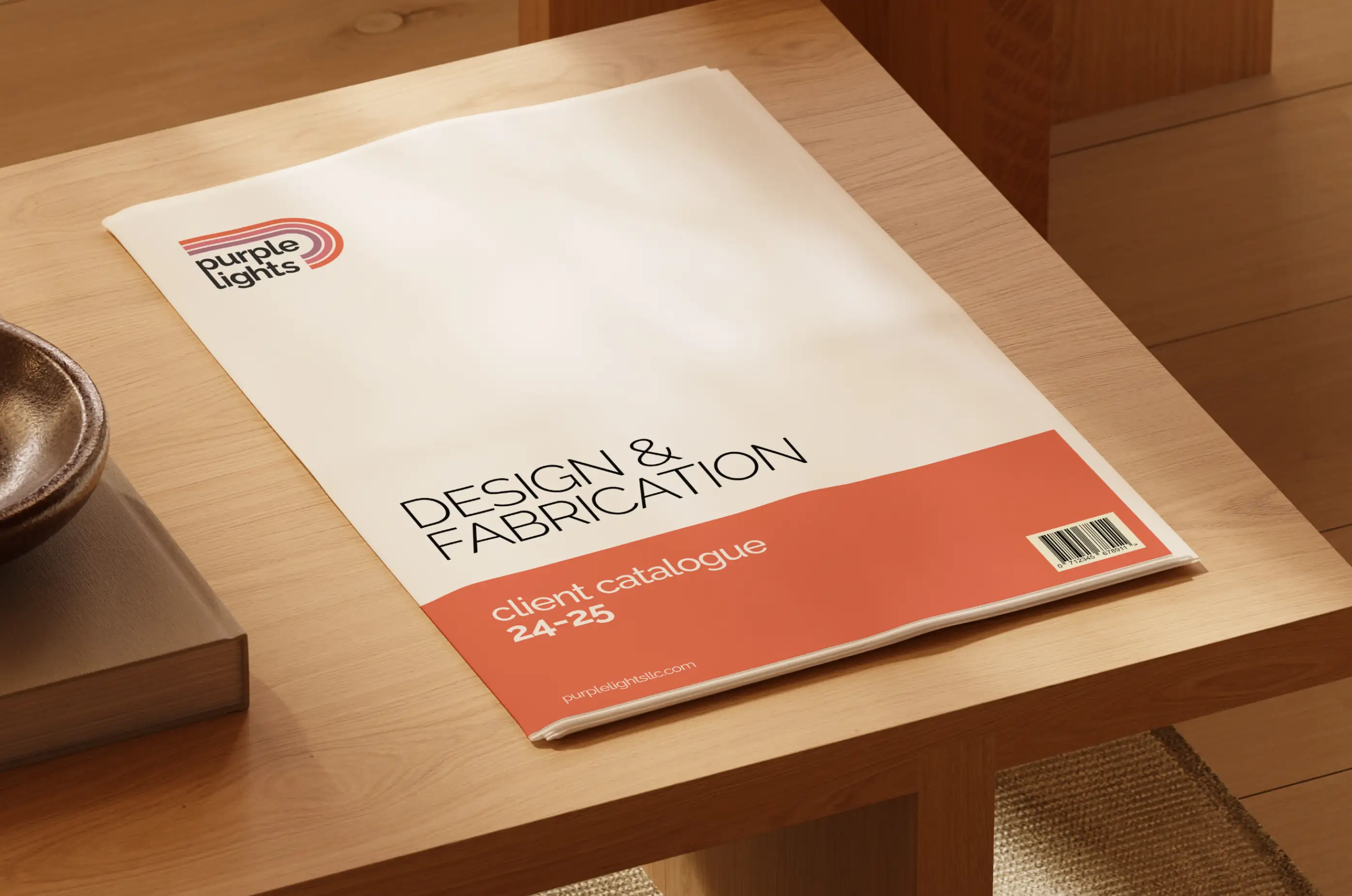 Purple Lights — Client catalogue cover on desk — Print collateral