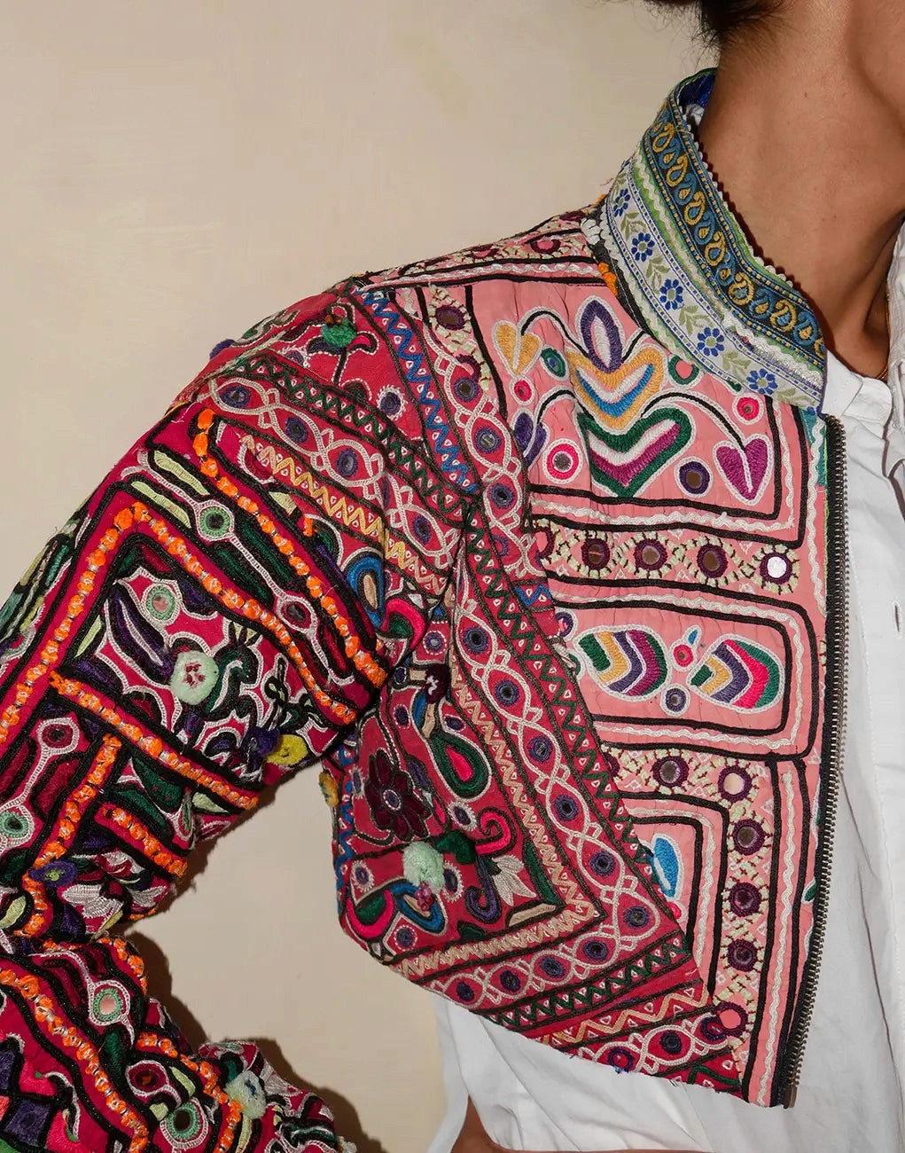 Cropped Chola Jacket III handcrafted from Rabari cholas with vintage silk sari lining, dropped shoulders and relaxed fit.