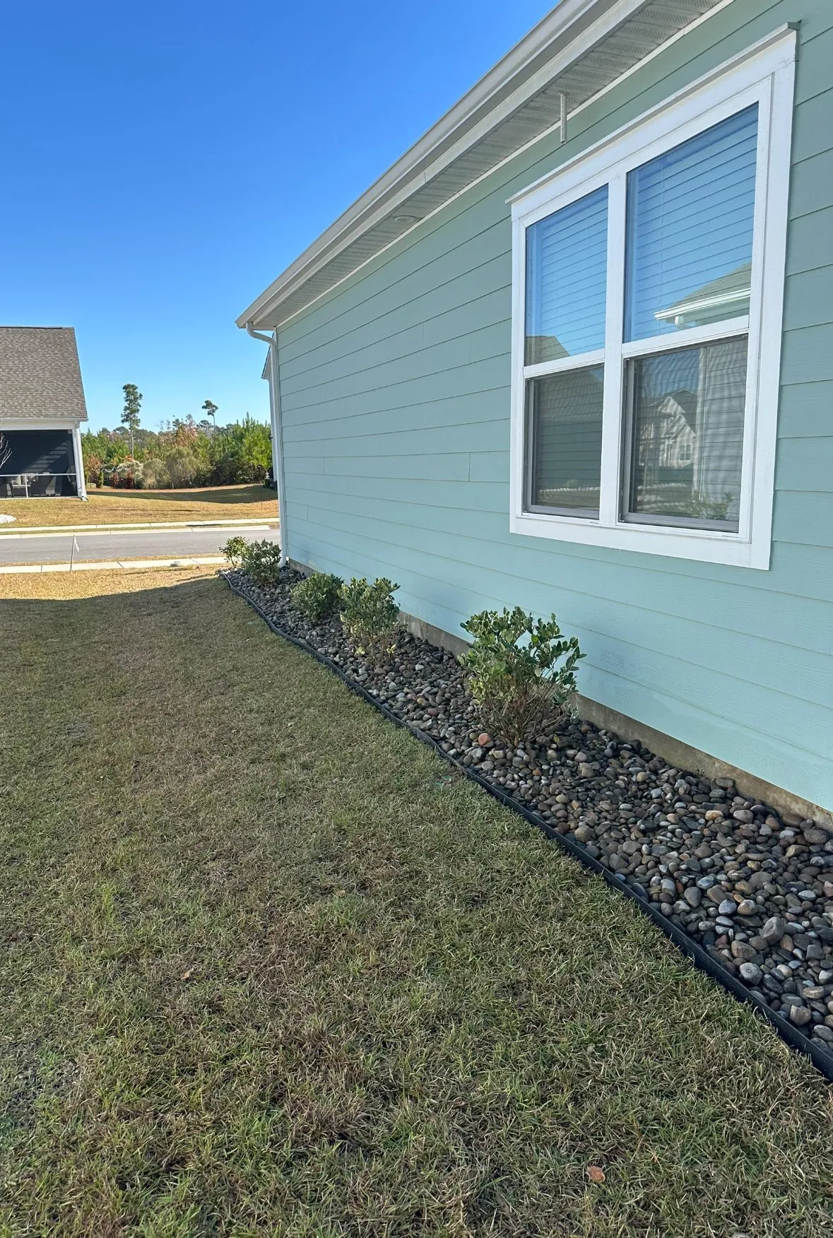 Beautiful landscaped garden with greenery and outdoor design elements.
