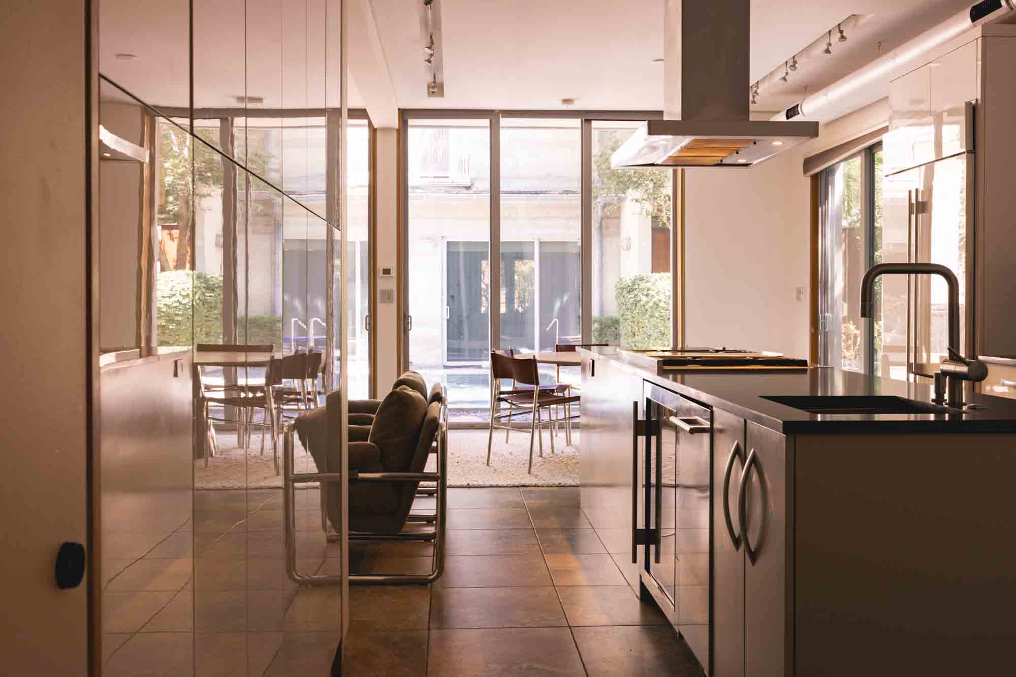 living area of Contra House showcasing modern Key West accommodations with sleek, mid-century design