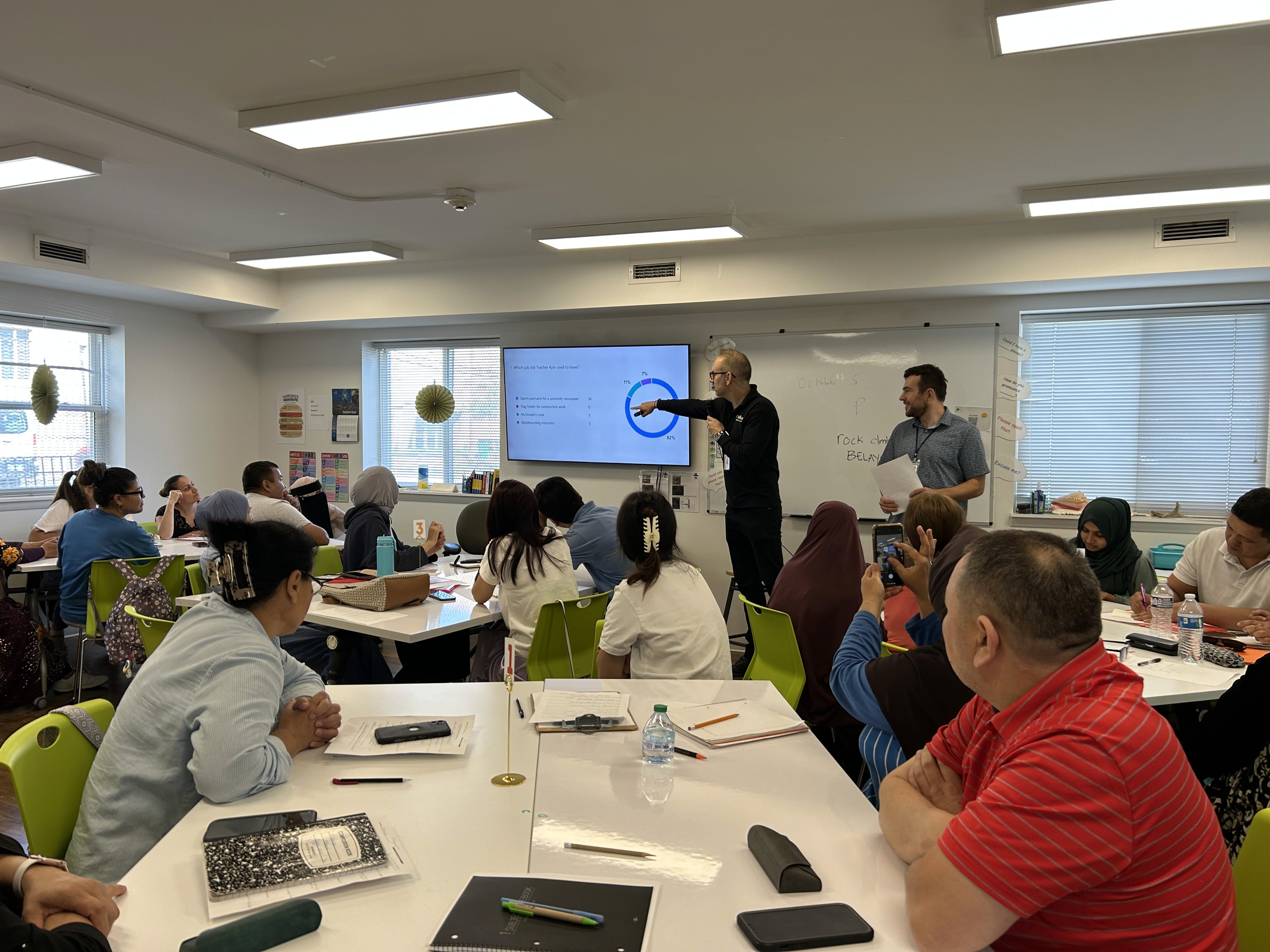 green chairs under umbrellas on shore