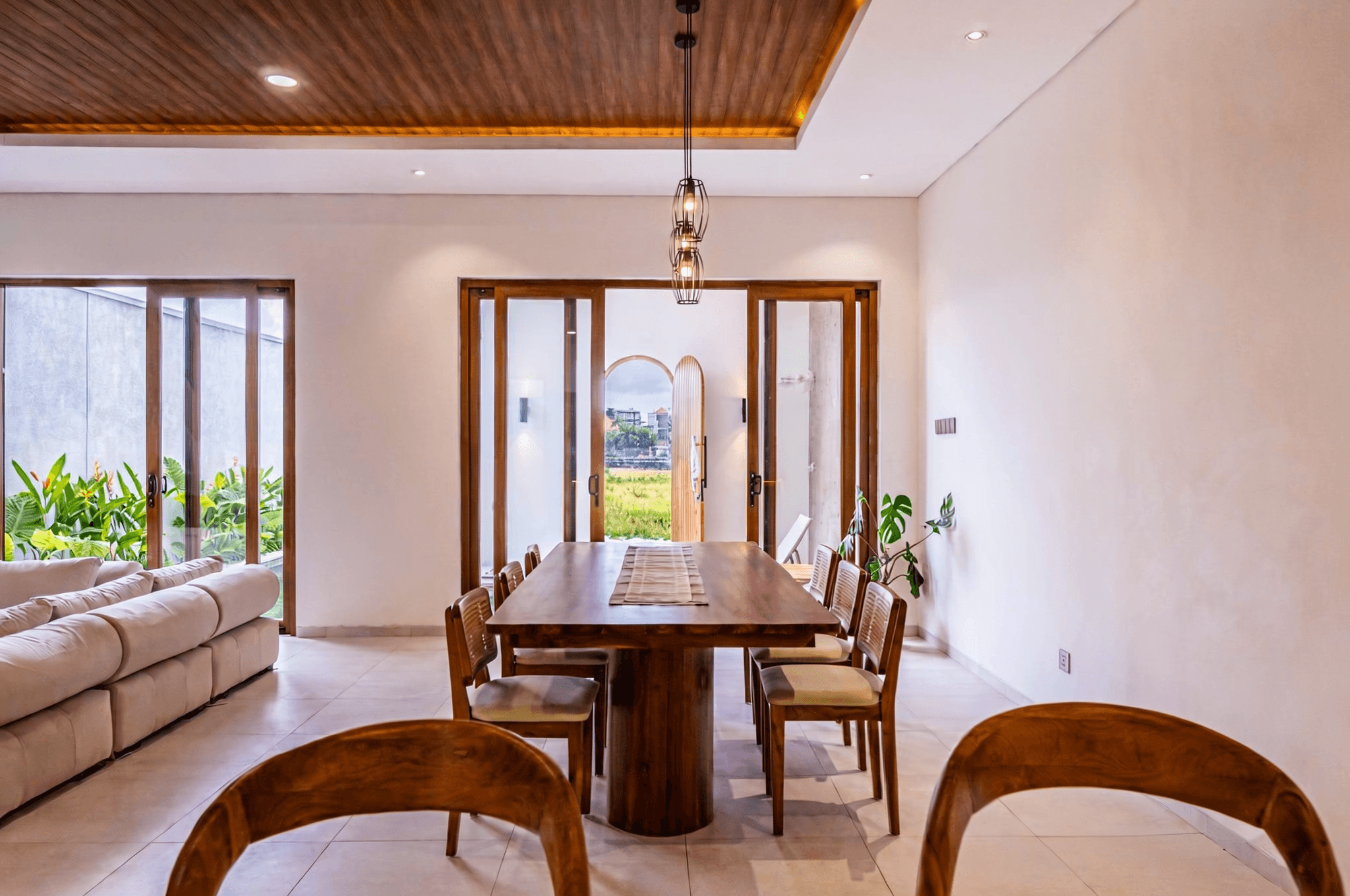 Minimalist white bedroom interior in Seseh, Bali, offered by our dedicated real estate team.