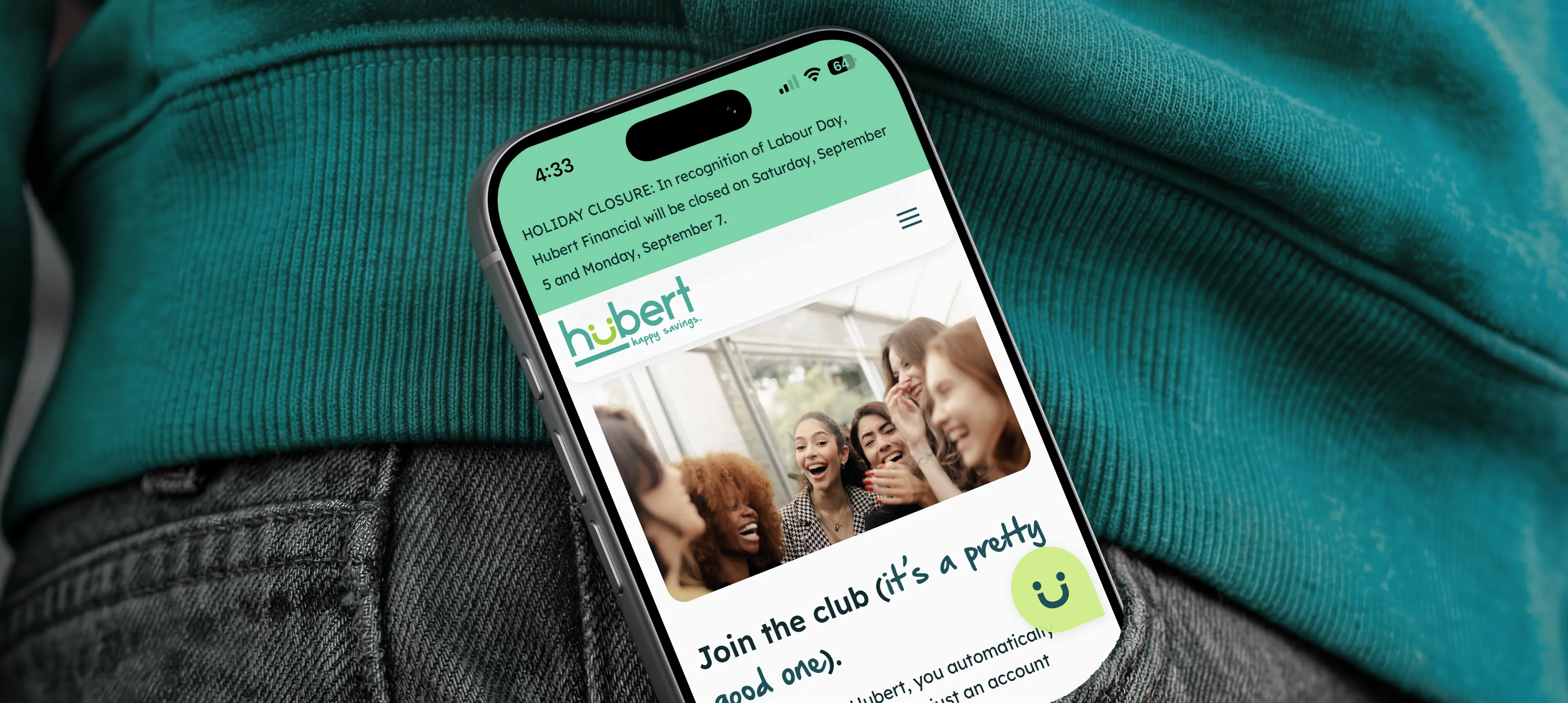 Hubert Financial About page on a cell phone poking out of a person's pocket.