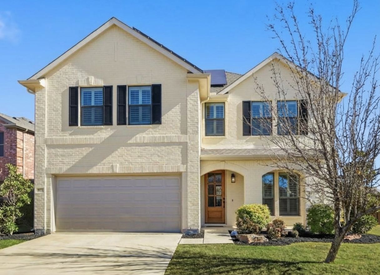 House painted warm white with black shutters and wood door using AI