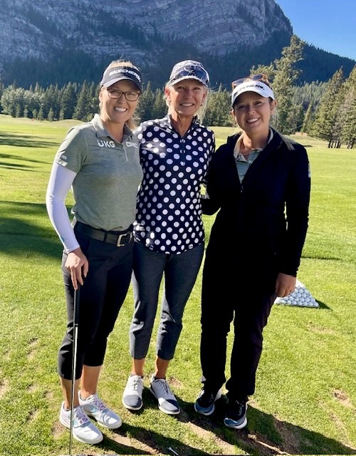 A lady with surfboard