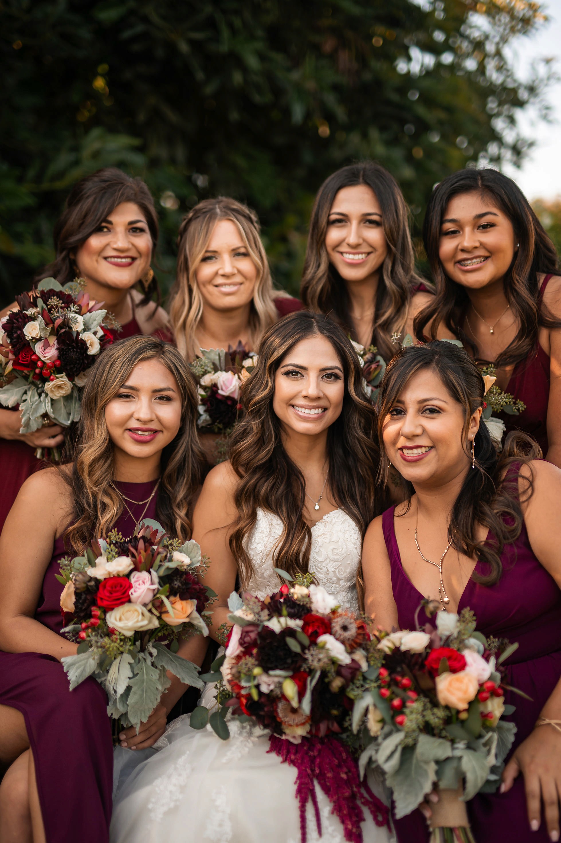 Flat lay wedding details with bouquet, rings, and sparkling bridal heels