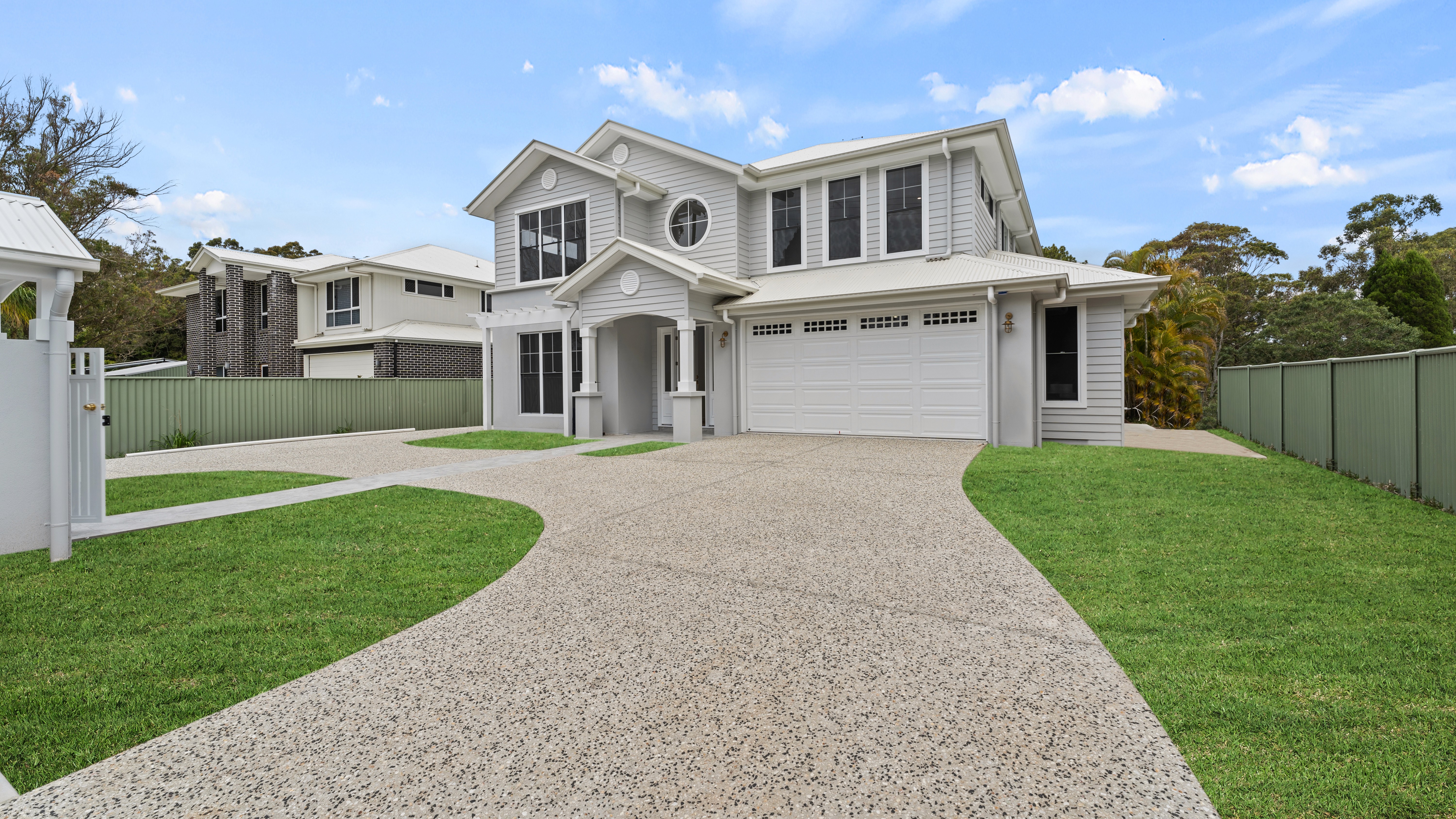 A custom designed two-storey home built on a Brisbane block, demonstrating effective site integration and structural planning.