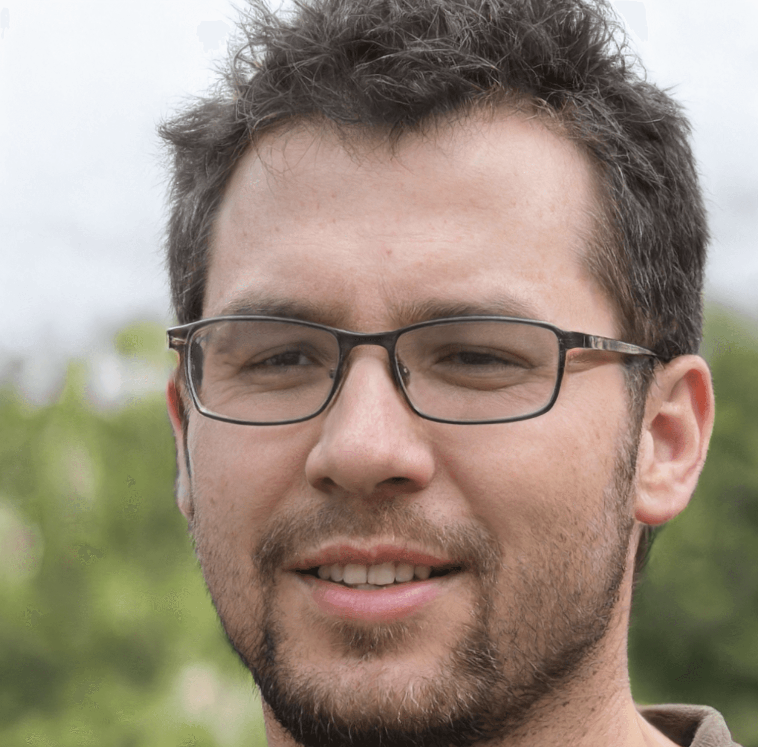 A person in a blacl coat and the brown hairs