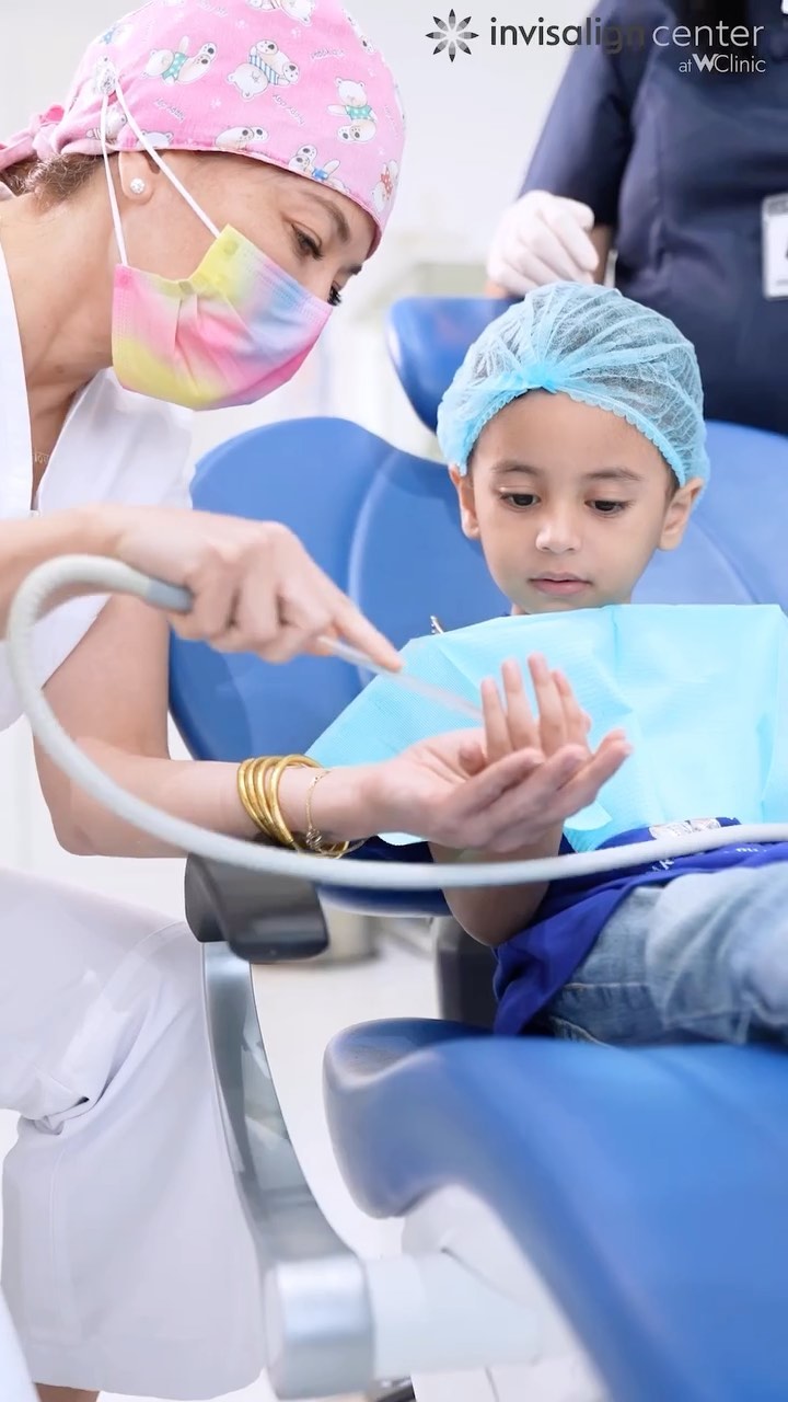 A pediatric dentist gives bespoke oral hygiene tips to children, helping build healthy habits and prevent future dental problems.