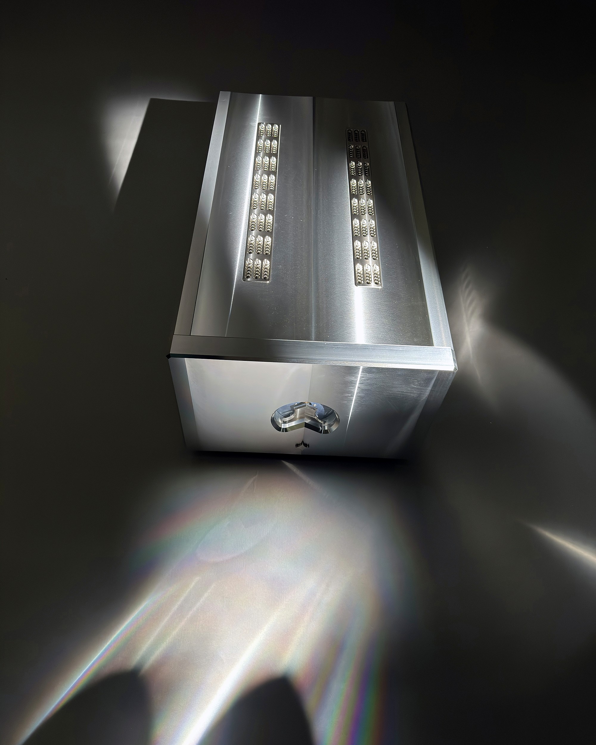 A behind the scenes photo from a product photoshoot by October Custom Publishing for The Absolute Sound magazine