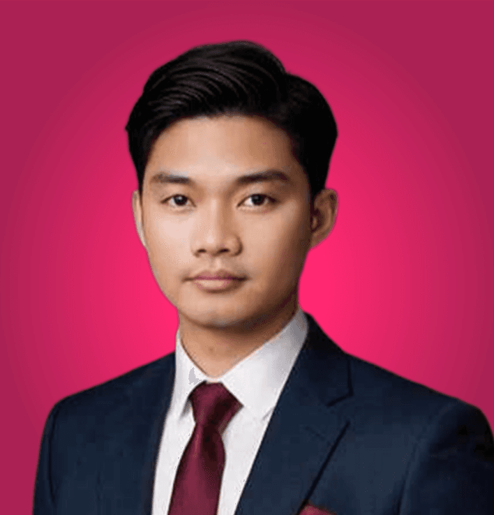 Mark Sencil, Executive Assistant at CSM, side profile portrait wearing a blue suit