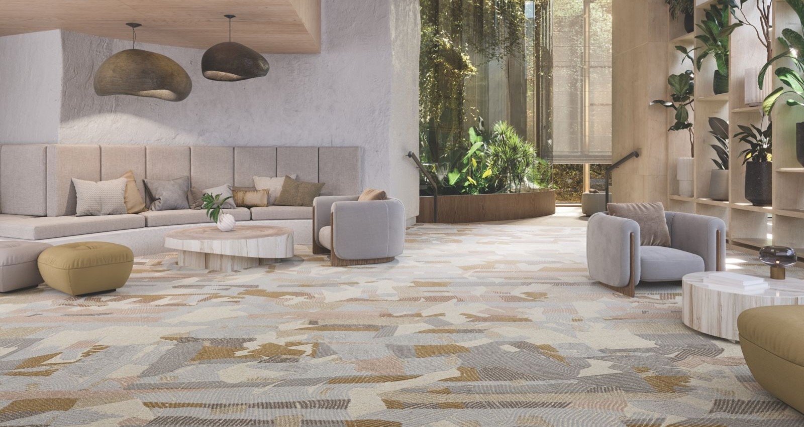 A bright, airy hotel lobby with a large-scale patterned carpet in warm gold, taupe, and soft grey tones. The space features organic modern furnishings, wood-paneled ceilings, and floor-to-ceiling windows with lush greenery beyond.
