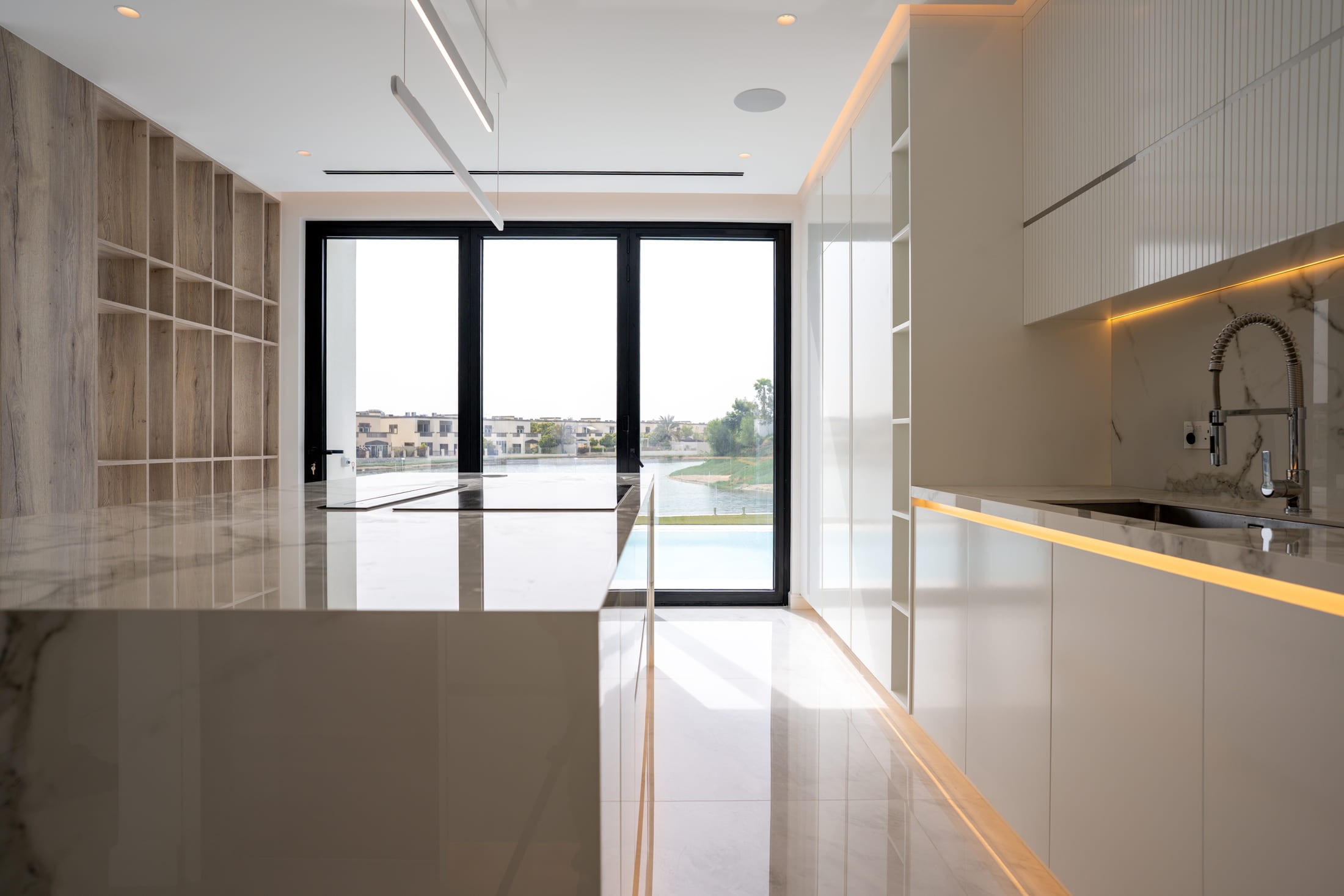 Image of a large villa with big glass windows