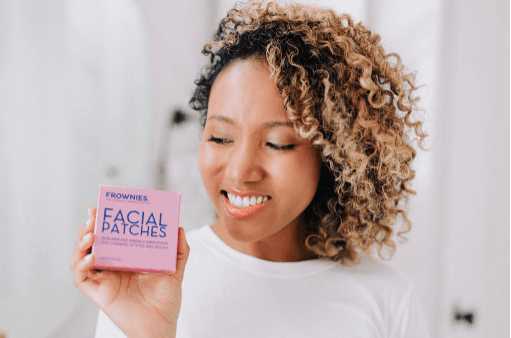 Person holding Frownies Soap