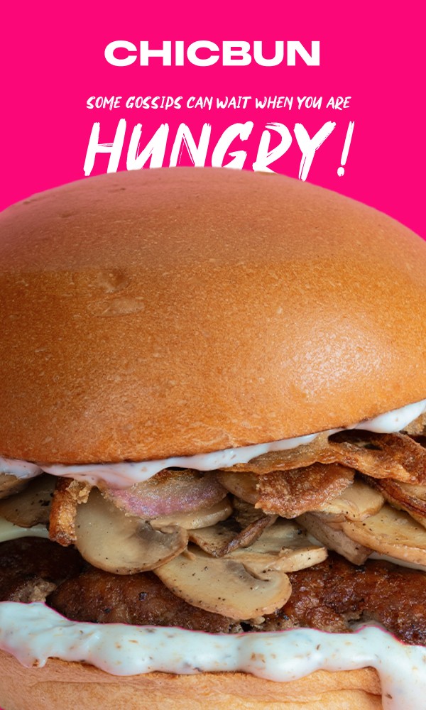 Close-up of a juicy chicken burger from CHICBUN with the tagline ‘Some gossips can wait when you are hungry.’