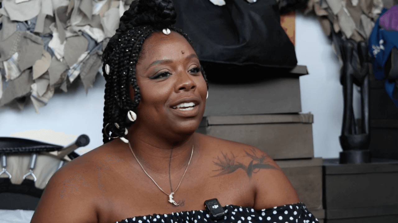 image of Patrisse Cullors sitting in her studio