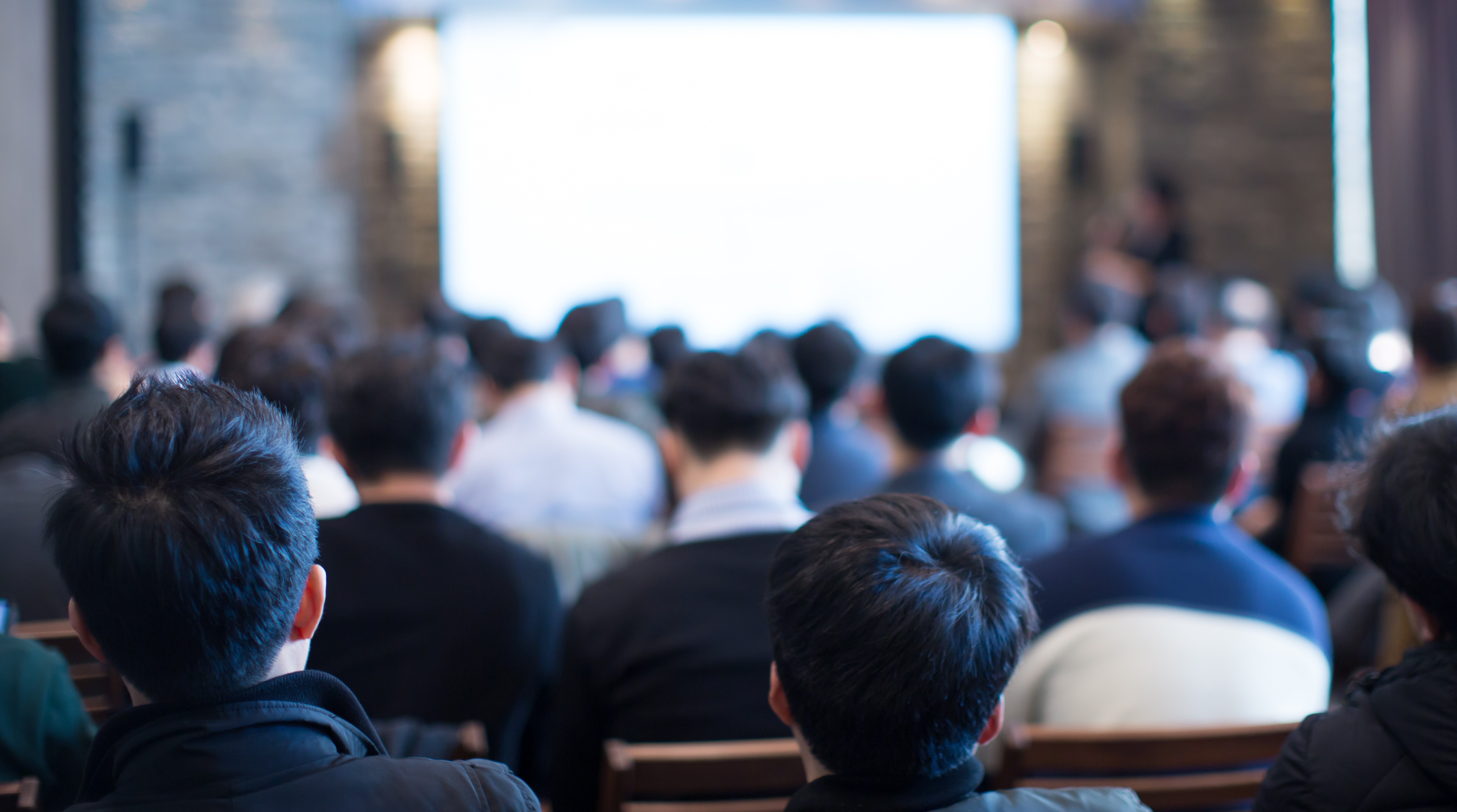 woman in gray hijab and gray coat