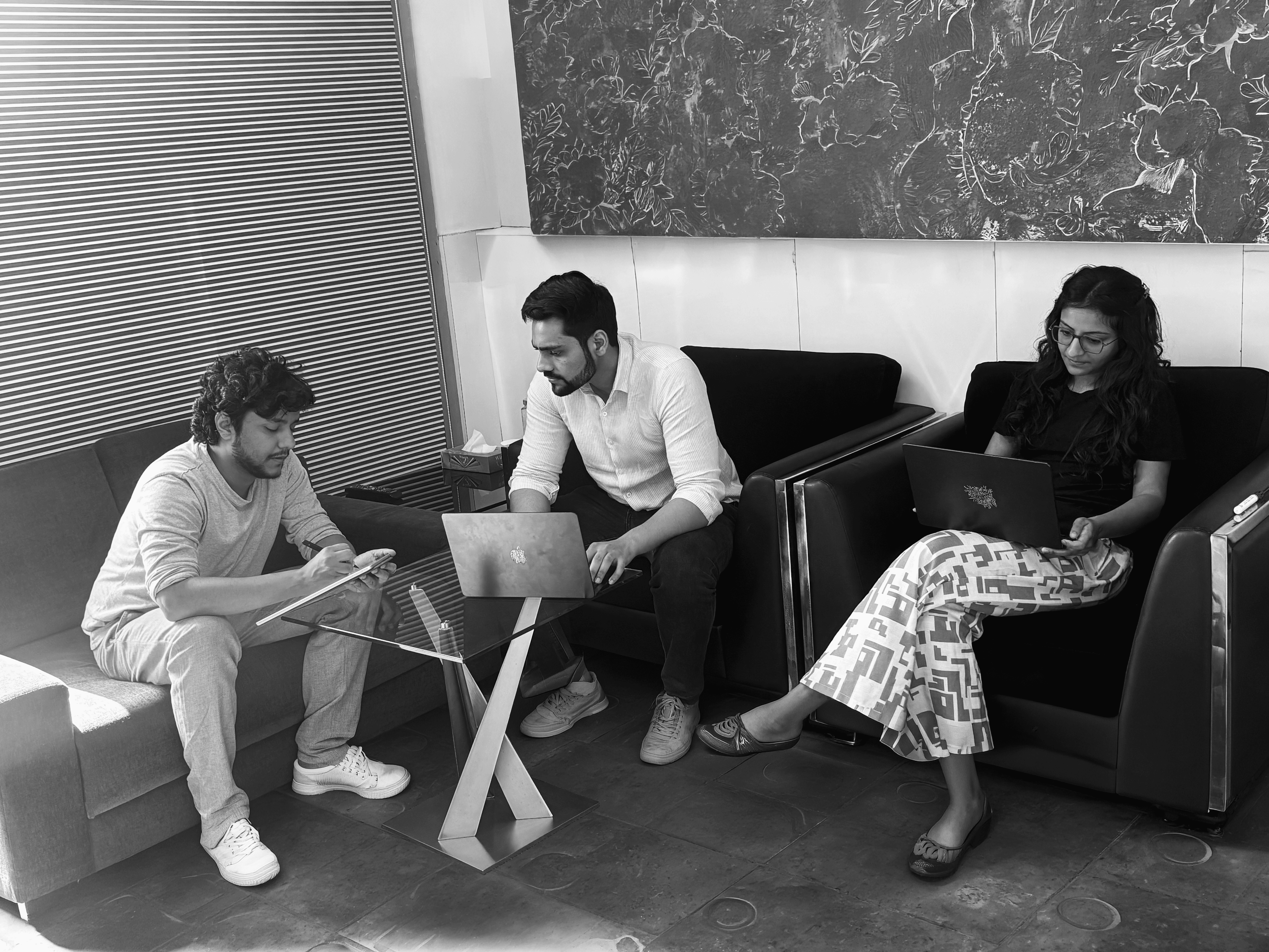 Group of people relaxing outdoors on a field or lawn