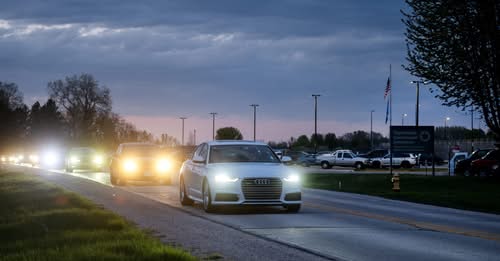 Cars flash their headlights and honk their horns as they pass by the Taycheedah Correctional Institution on Thursday, May 7, 2026, in Fond du Lac, Wis. Angela Major/WPR