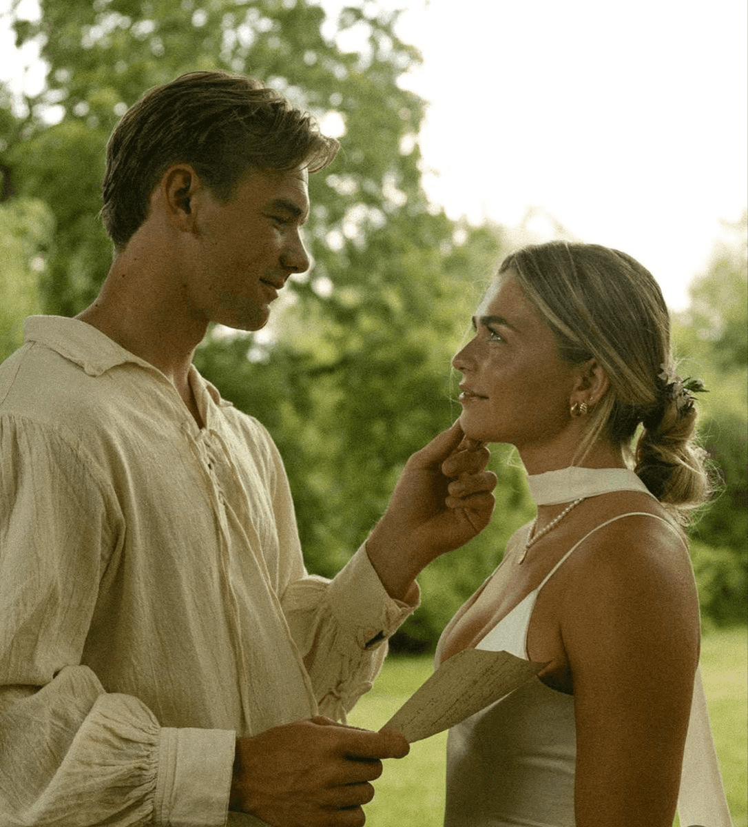 A cozy scene with warm sunlight casting stripes, featuring a potted plant and soft towels on a window sill.
