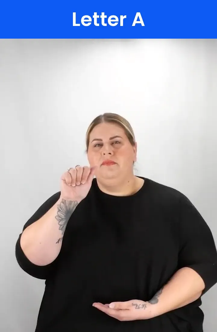 A Deaf signer signs A in ASL