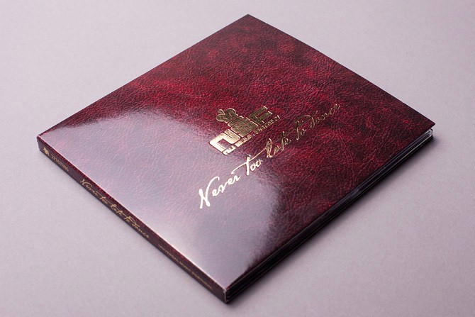 an image of a red and metallic gold digipak packaging with a premium finish