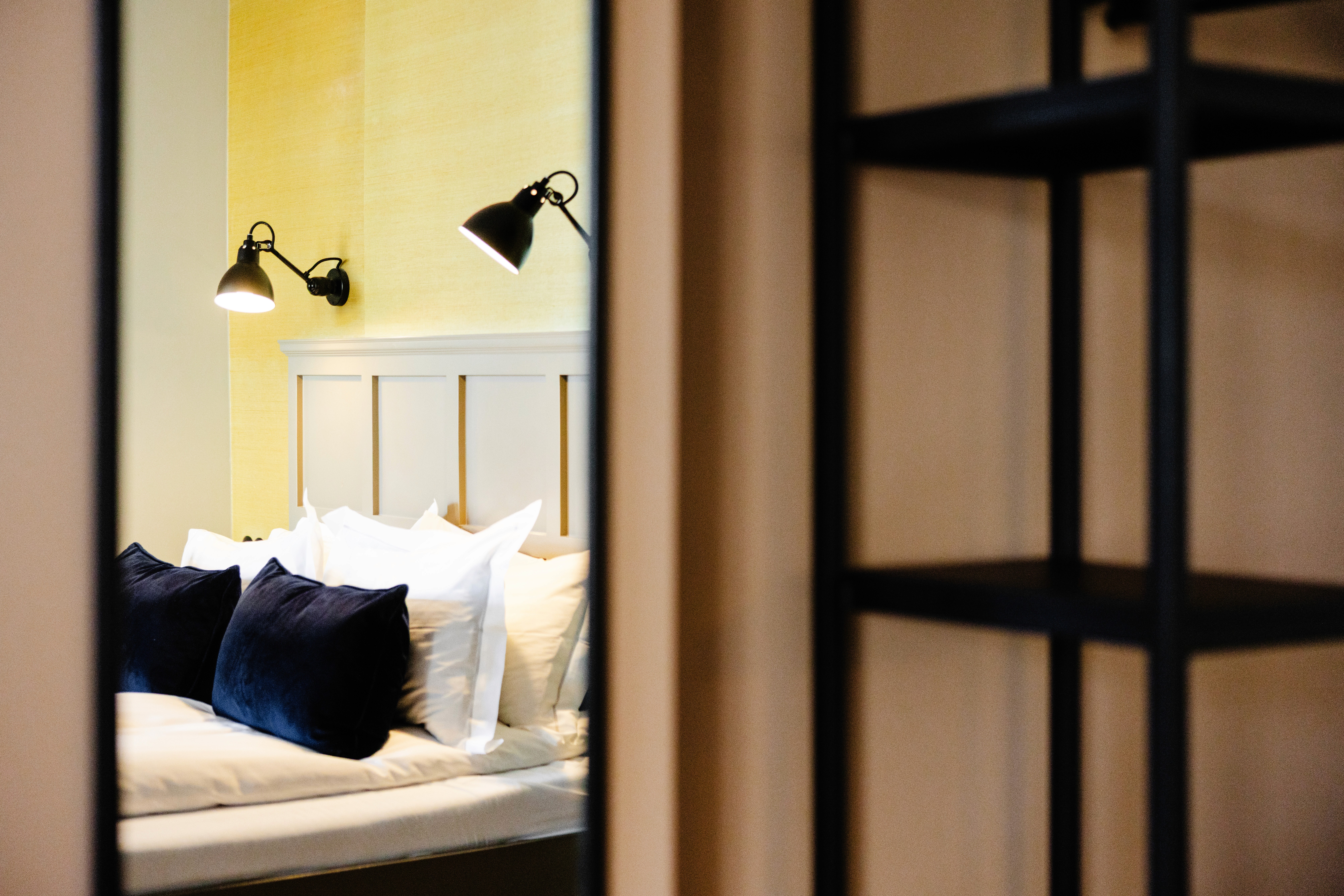 Scandinavian-inspired bedroom at Kvosin Downtown Hotel in Reykjavik.