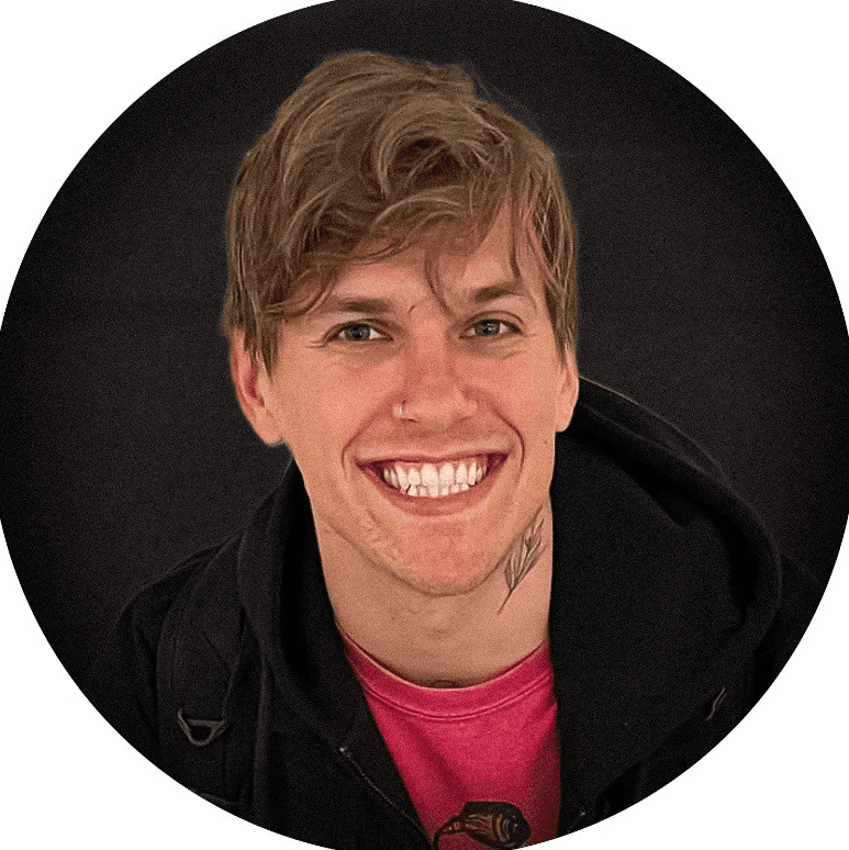 Profile portrait of a man in a grey shirt