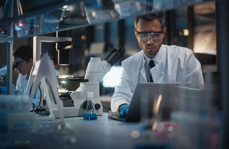Urologist testing a sample for potential disease