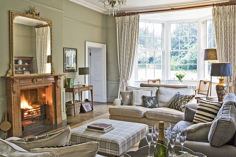 Hartingtons Heritage Tours hotel, Darley House, Sitting room with fire place