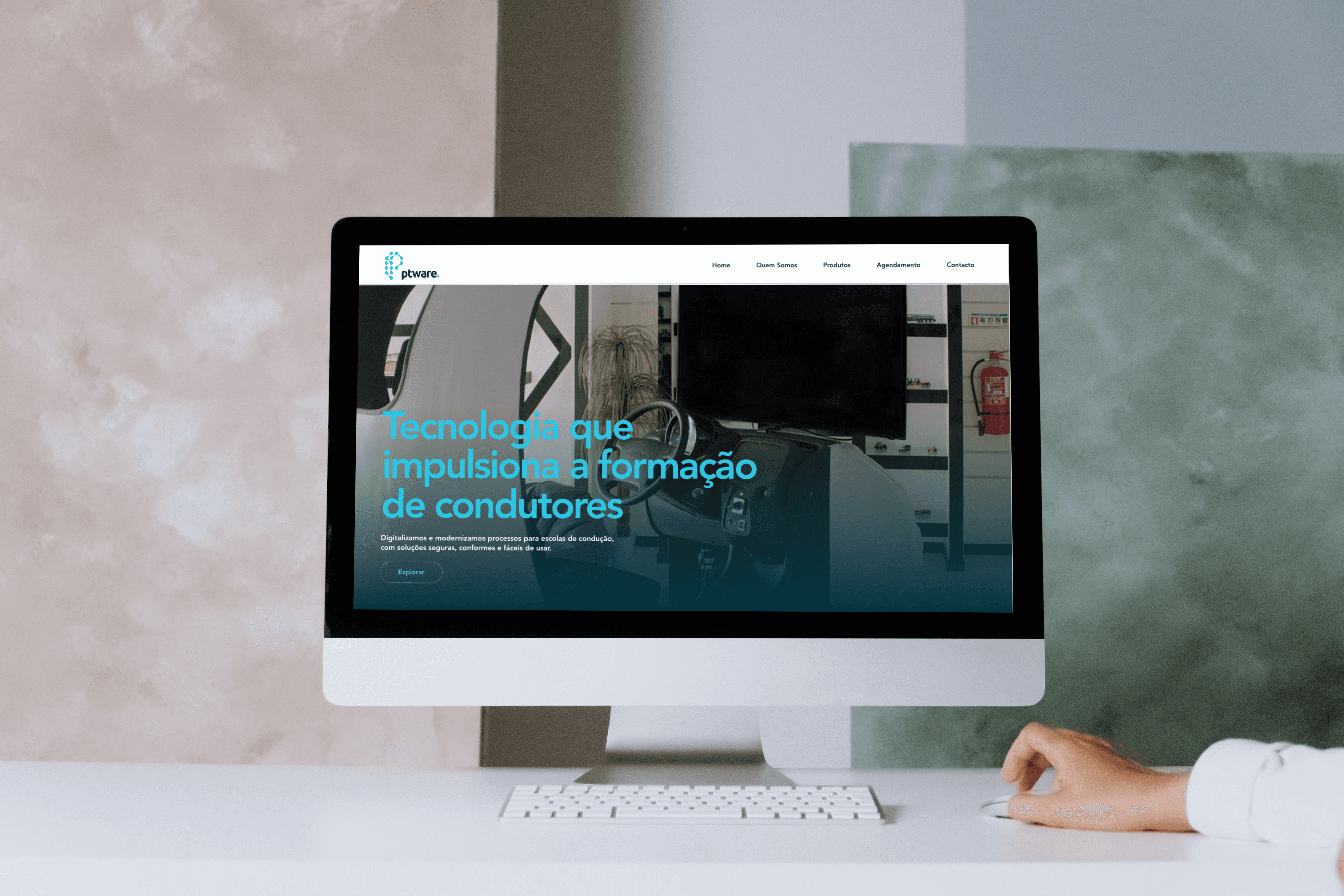 Mac display mockup shows the website