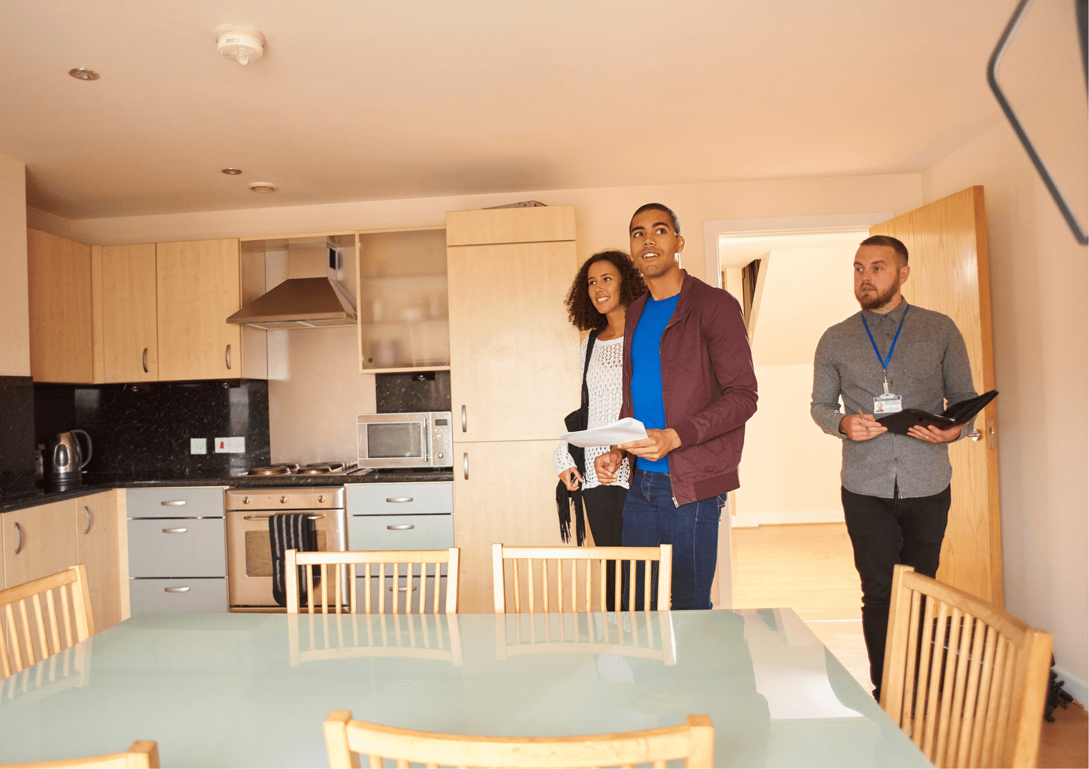 people sitting on chairs in front of table