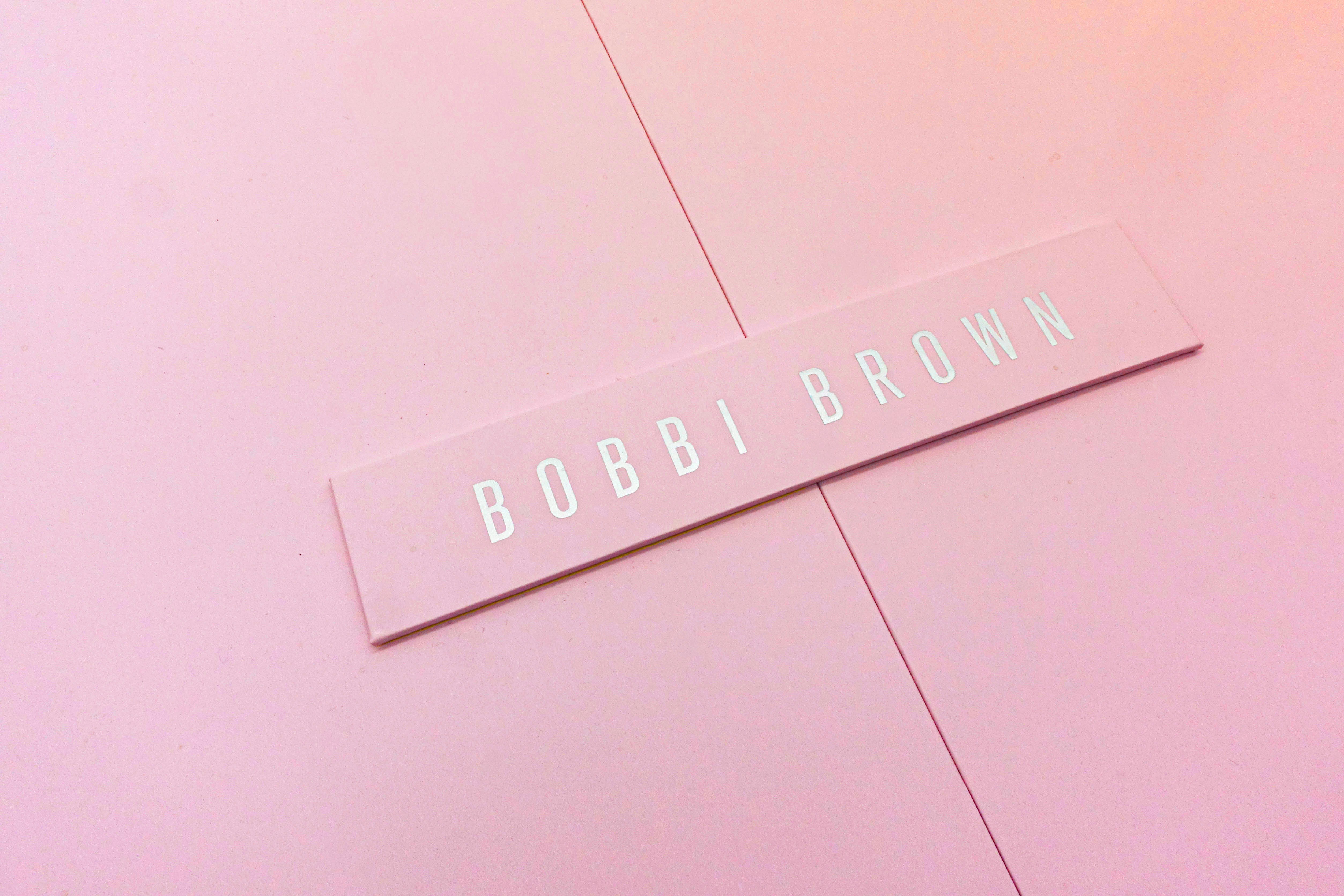 Minimalist book cover on white stairs with clean editorial design