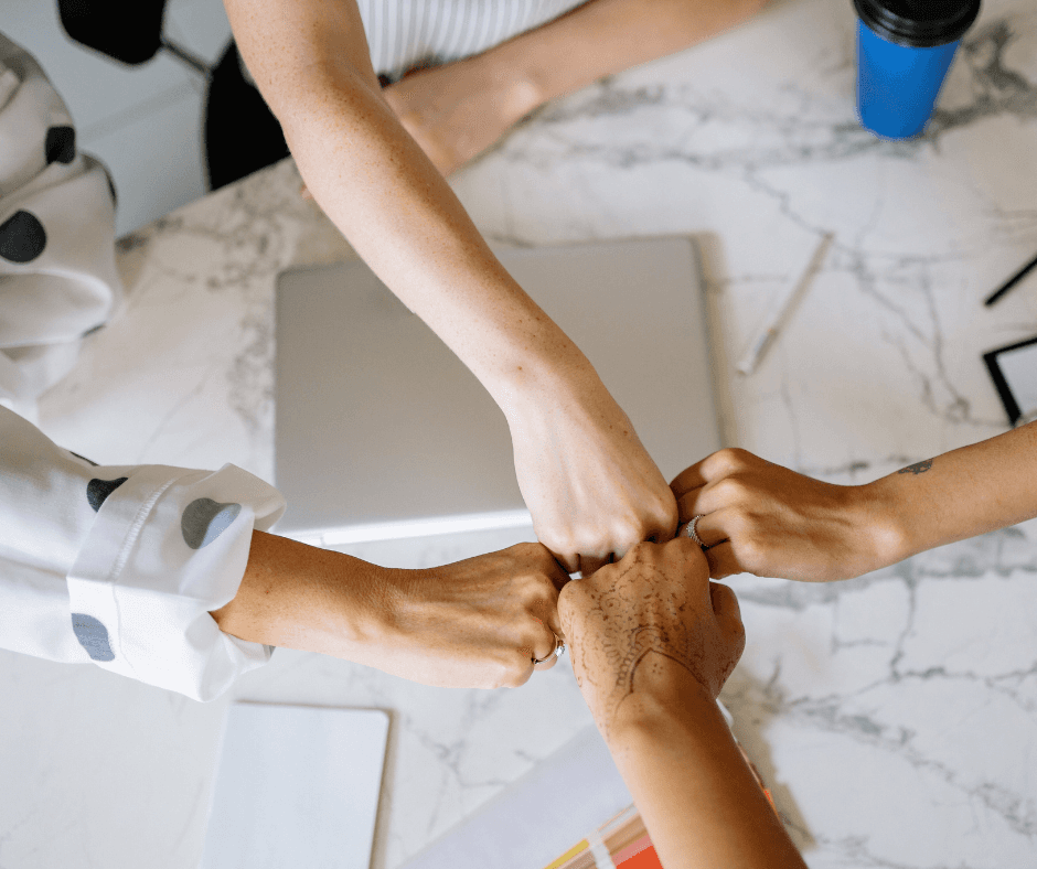 man sitting beside woman looking at a contract on DocuSign