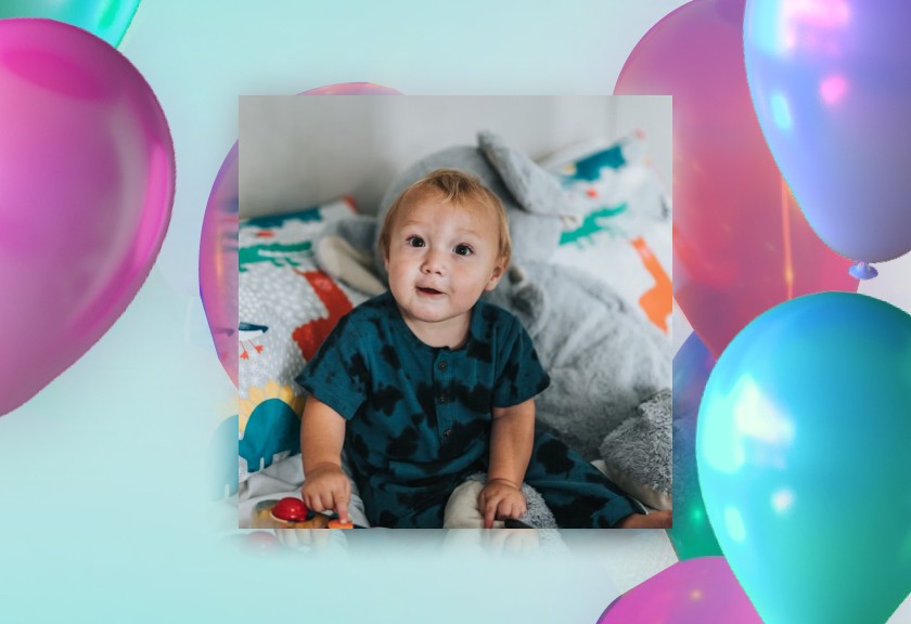 Clean and romantic baby shower invite with floral border illustrations and muted “You’re Invited” text in a frosted finish.