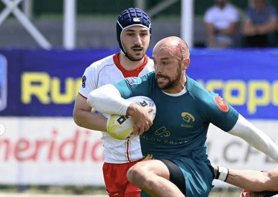 two opposing rugby players