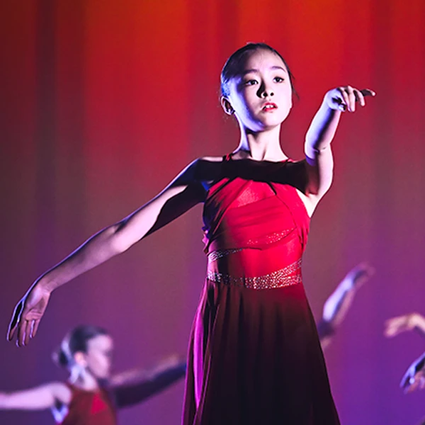 Junior lyrical dancer performing on stage at the Seymour Centre