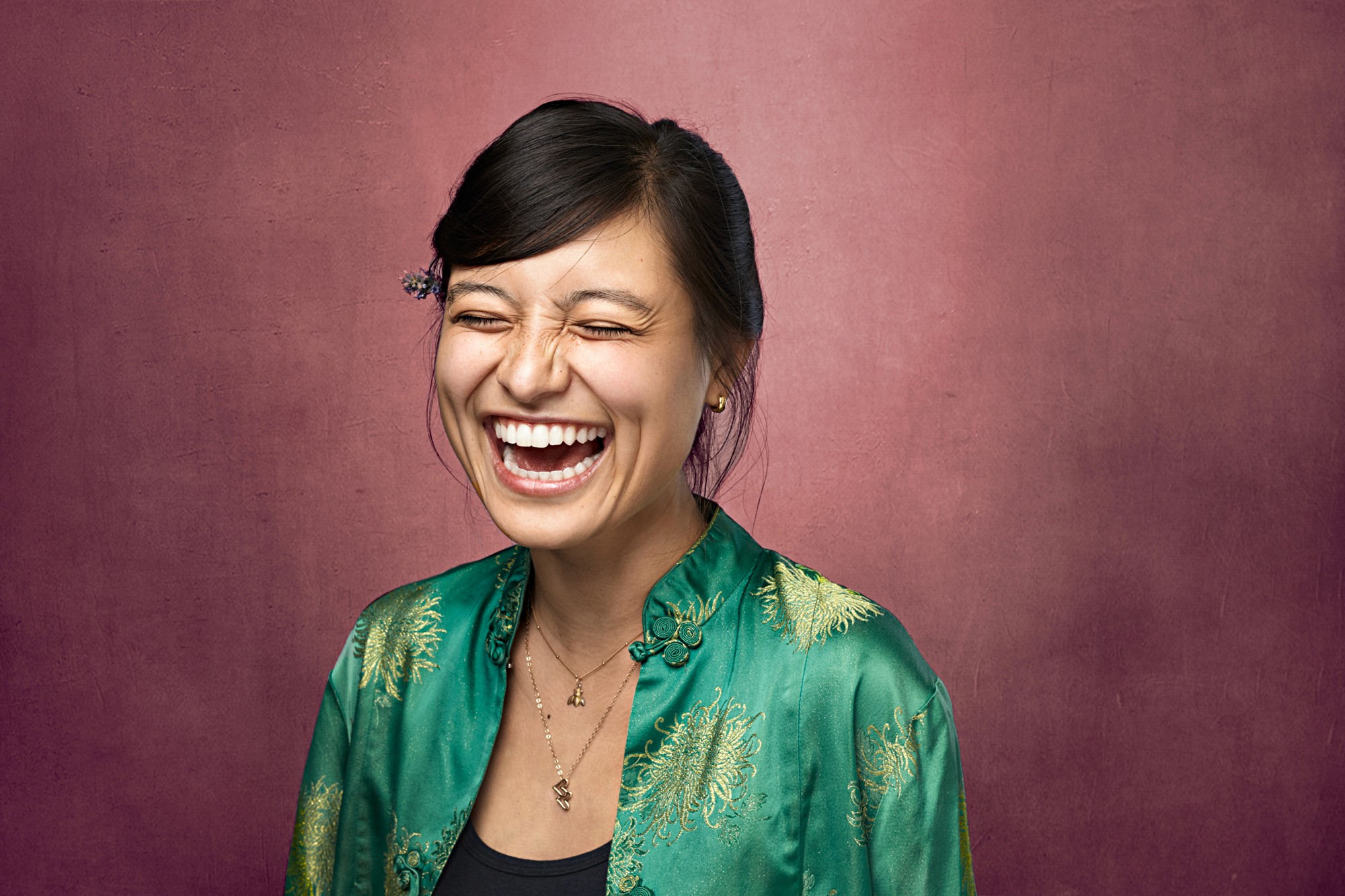 Sharp corporate headshot of Latino man in suit and tie