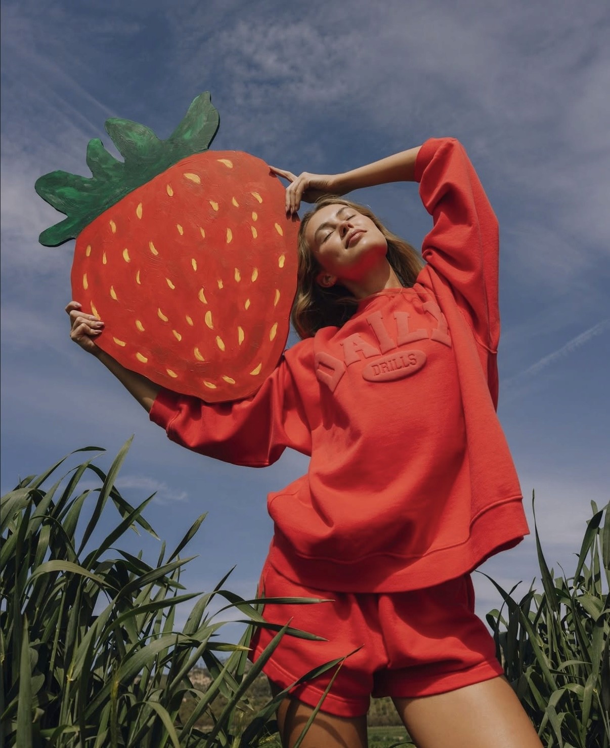 women holding strawberry