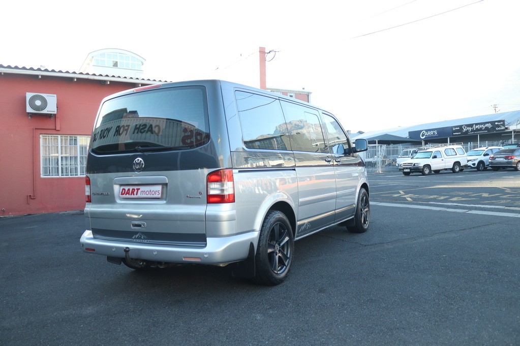 man in white crew neck shirt wearing black framed eyeglasses