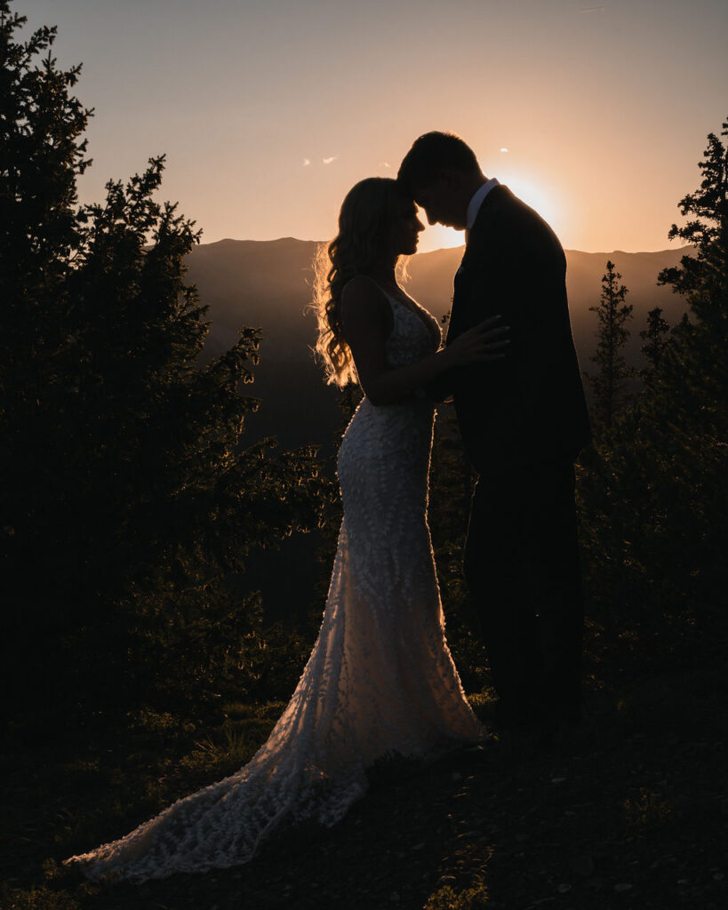 Romantic sunset portrait of couple at Smith Cabin Aspen wedding with alpine glow