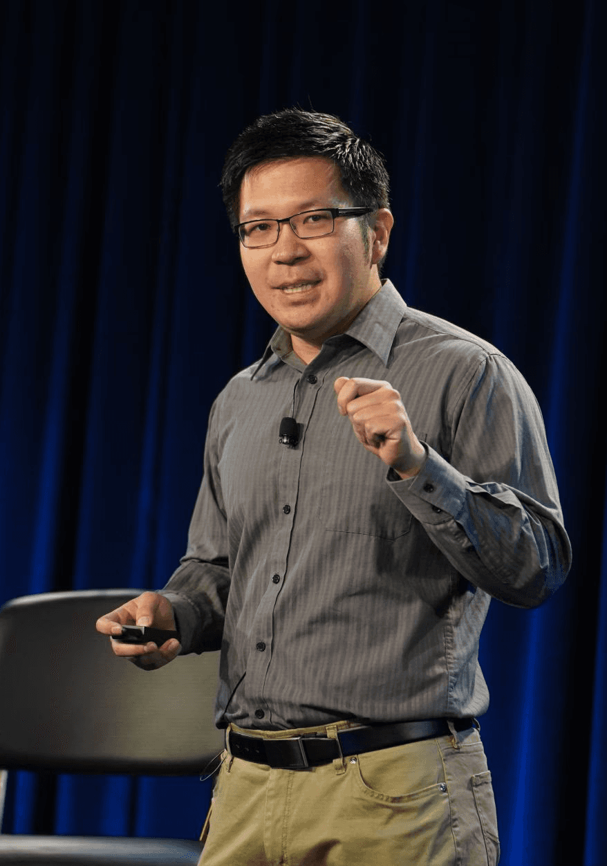 Image of Wainwright Yu giving a speech on stage