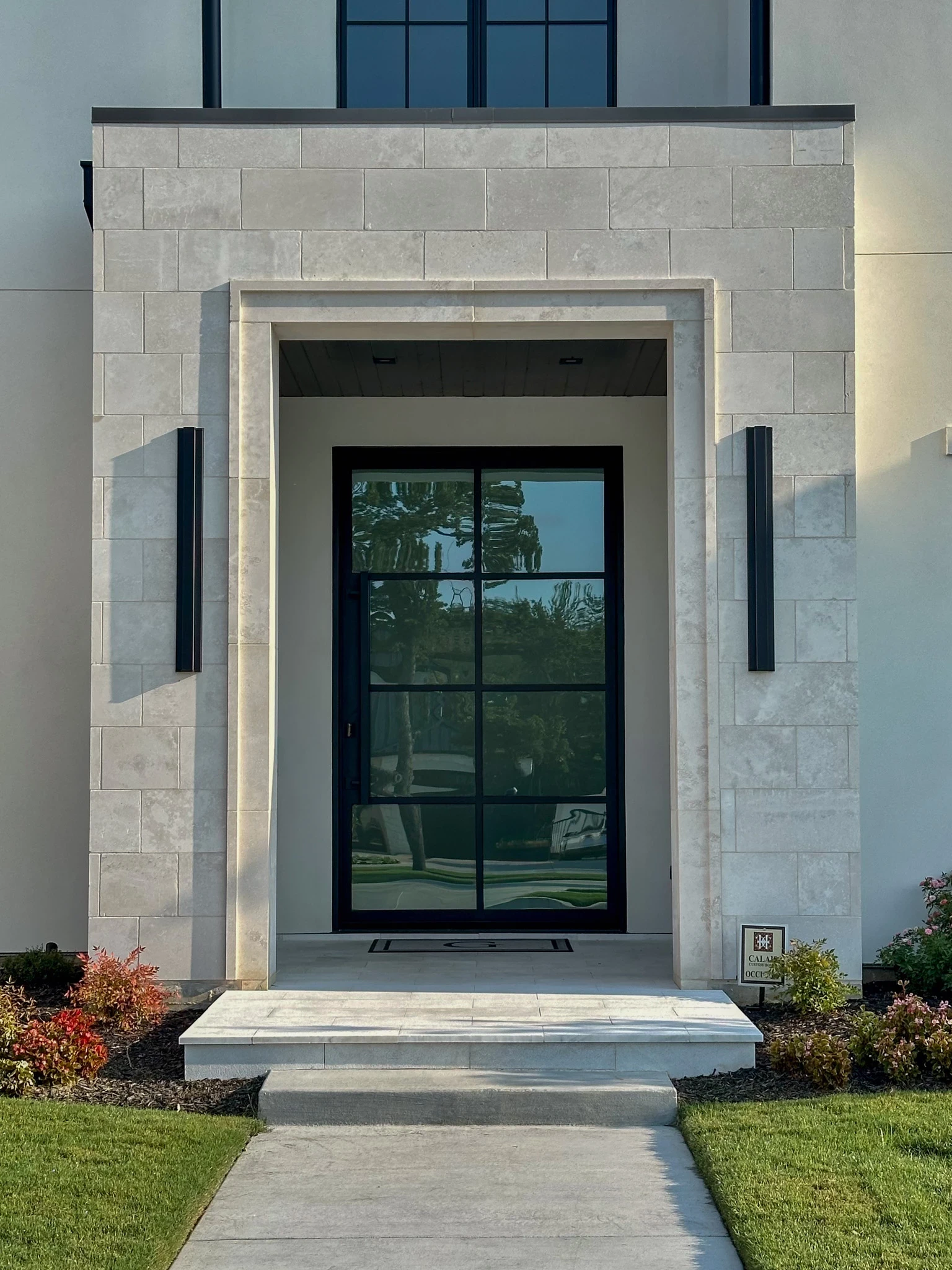 8 lite pivot door on a DFW home entryway by M2 Metals Iron Doors DFW