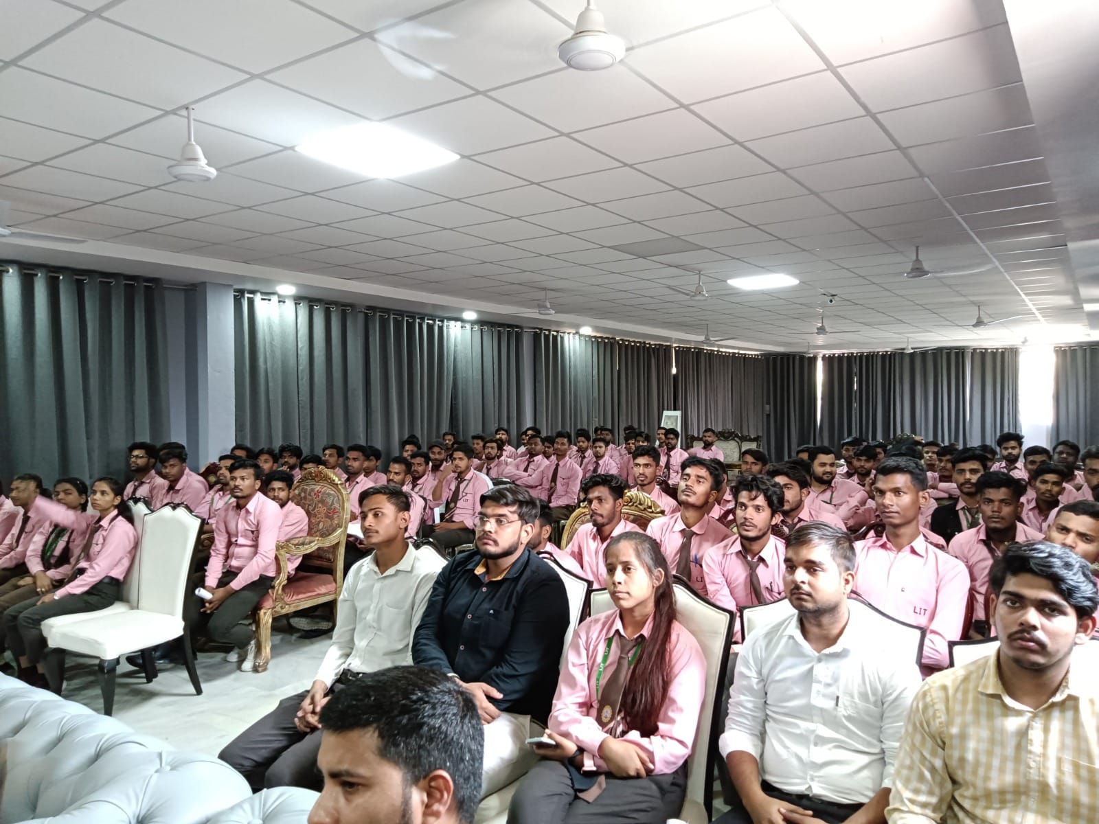 people sitting on chair in front of laptop computers