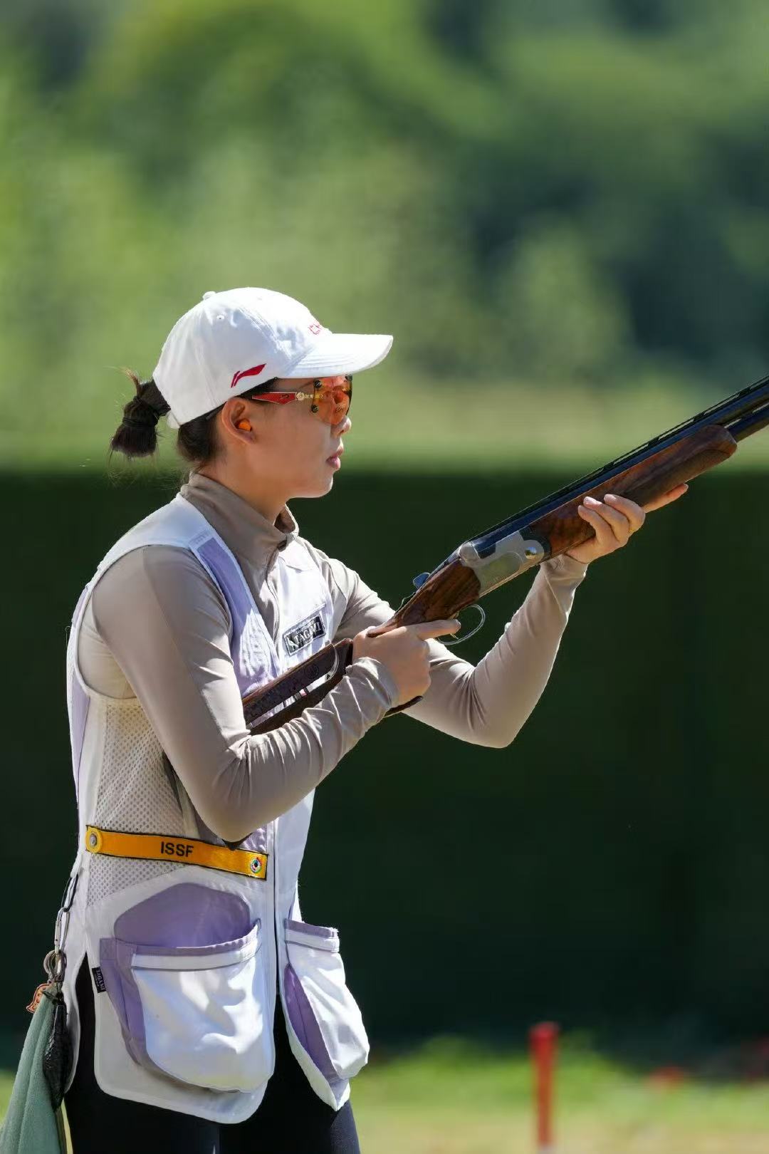 Woman athlete for skeet individual