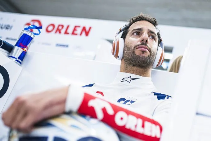Daniel Ricciardo wearing headphones during the ORLEN photo shoot