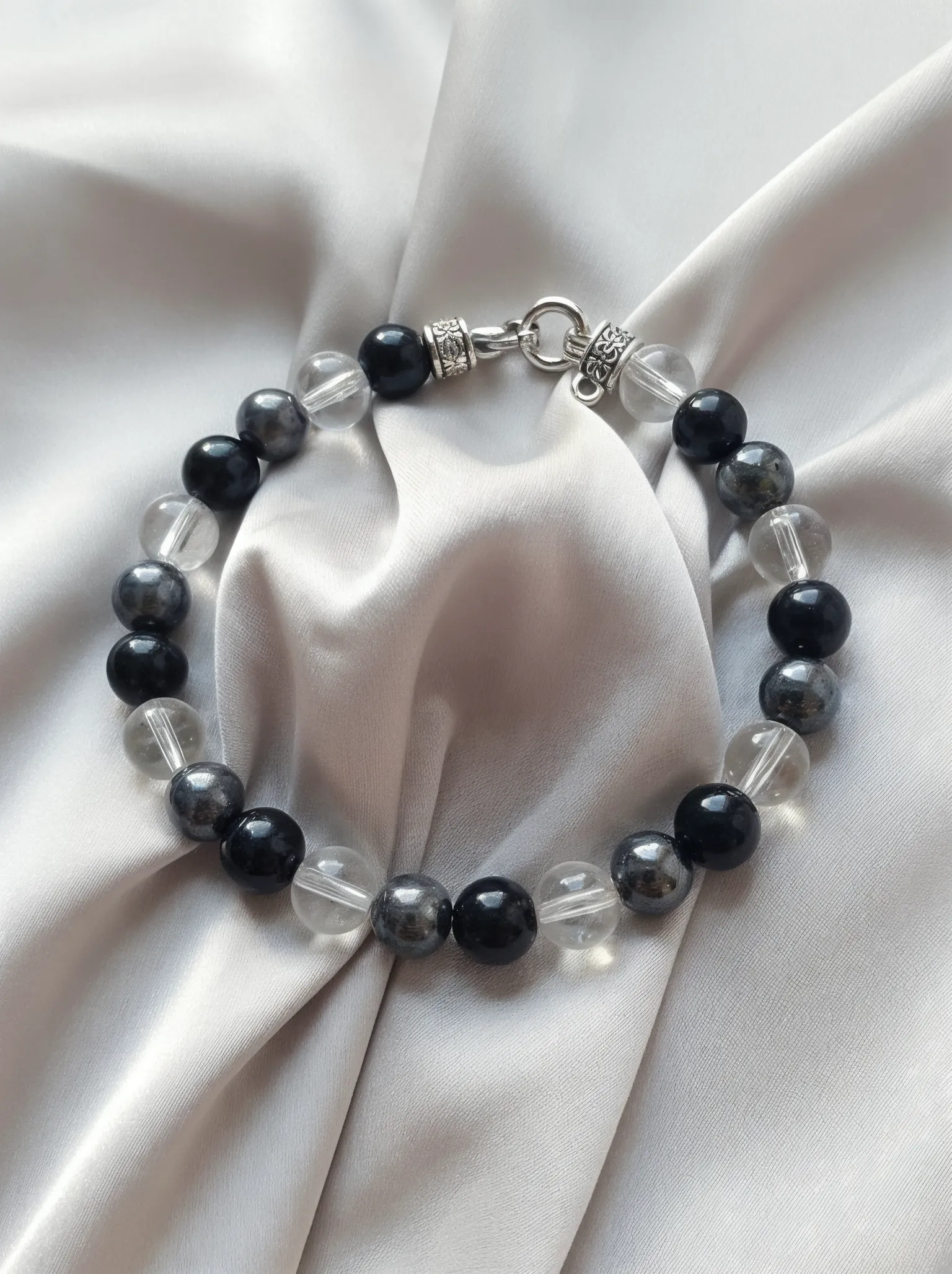 Bracelet placed on a fabric setting.