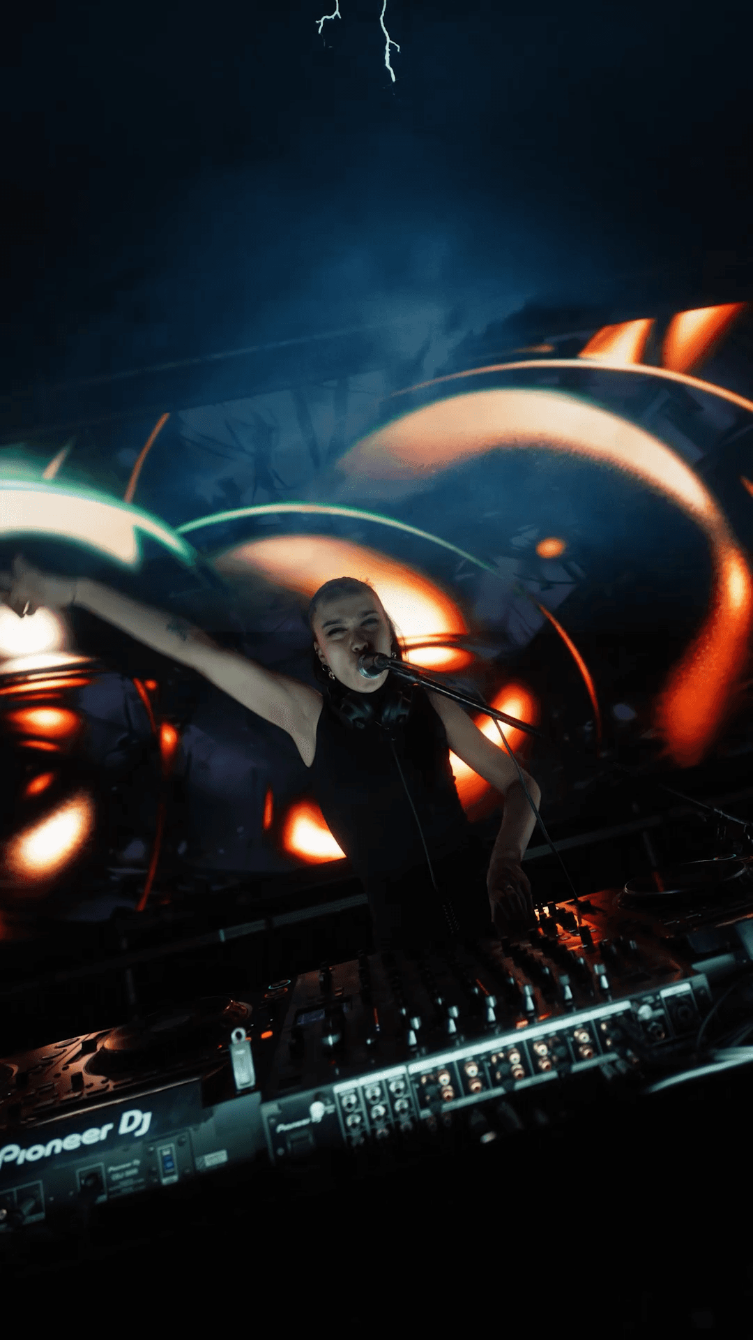 Minimalist lemon product photo with glass cup on pastel yellow background