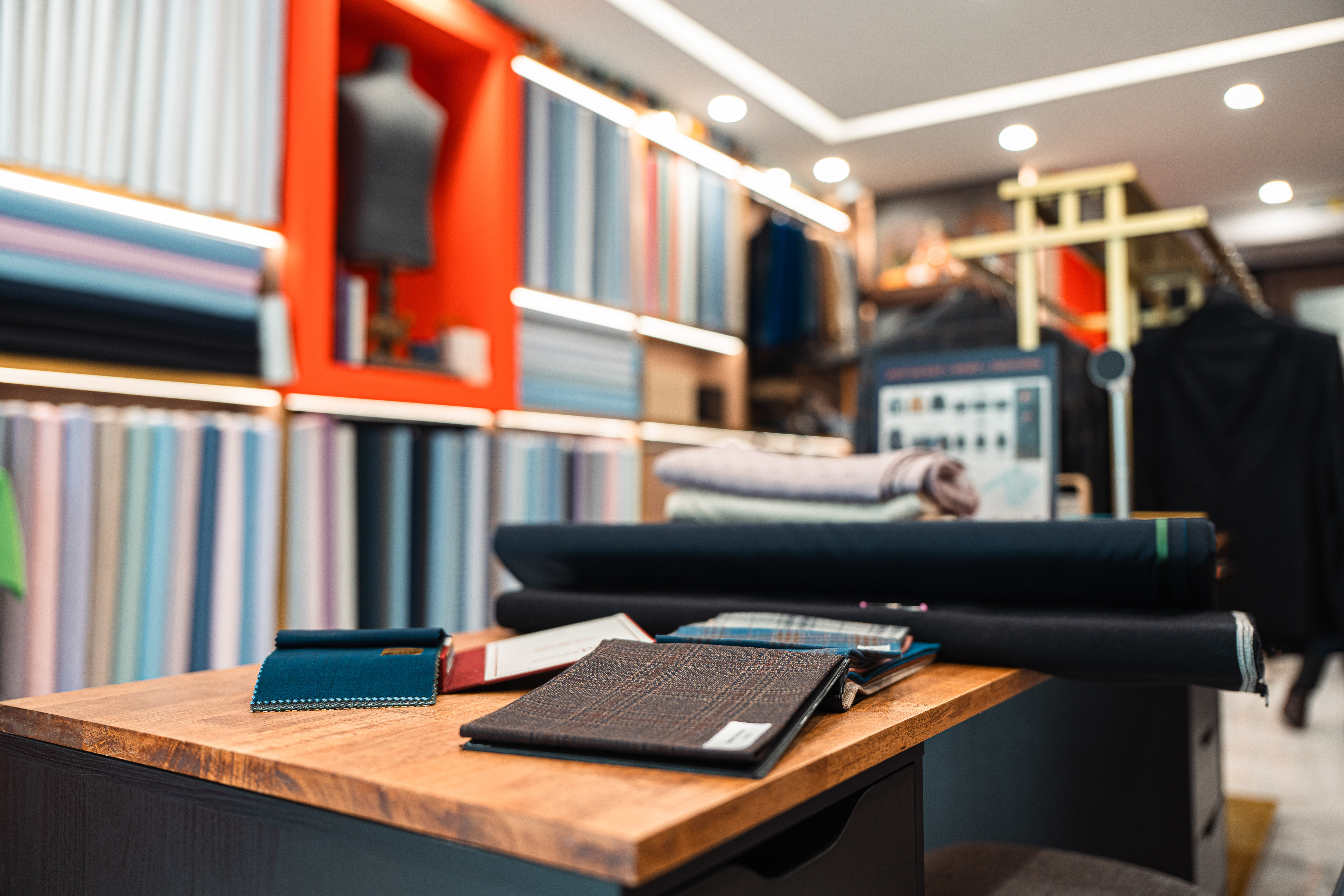 a man sitting at a desk with an old typewriter
